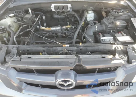 2005 Mazda Tribute I z USA, uszkodzony, nr VIN 4F2YZ02Z15KM39790